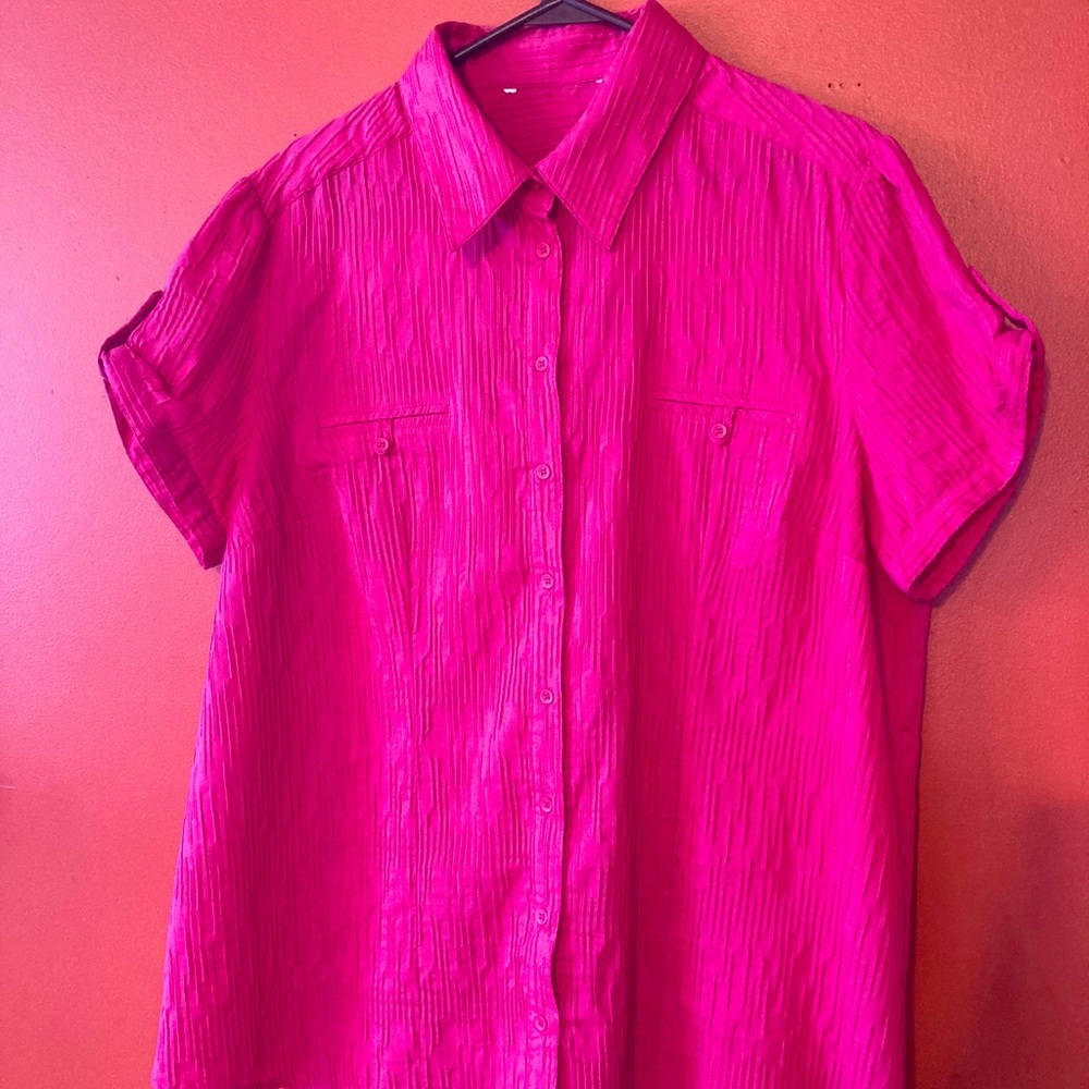 pink stretch material button down blouse